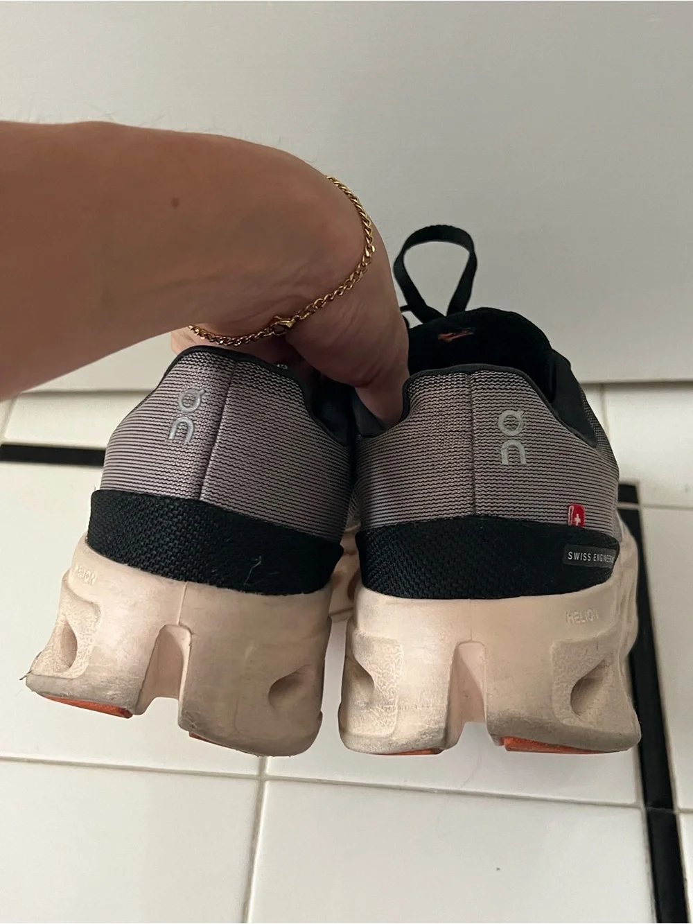 On Women’s Cloudsurfer Next running shoes in Gray and Black
